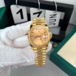 Rolex Day Date 228238 Gold Pink Dial 40mm 1.jpg