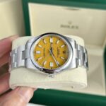 Rolex Oyster Perpetual 124300 Yellow Dial 41mm 2.jpg