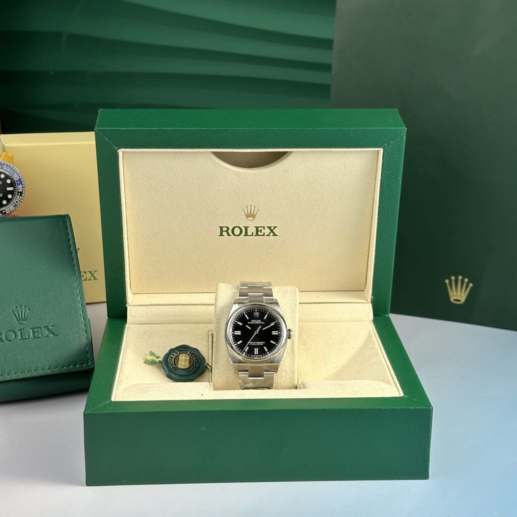 Rolex Oyster Perpetual 126000 Black Dial 36mm 1.jpg