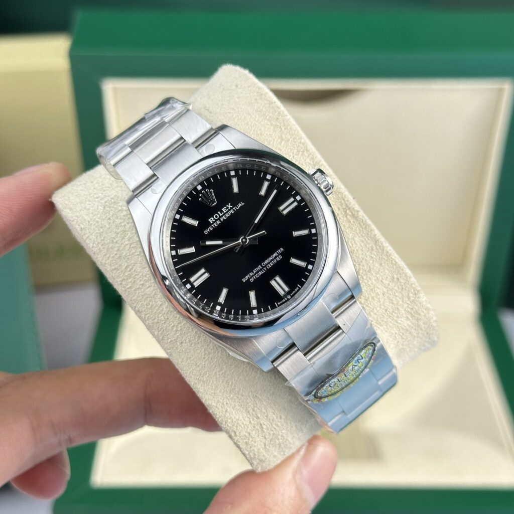 Rolex Oyster Perpetual 126000 Black Dial 36mm 2.jpg