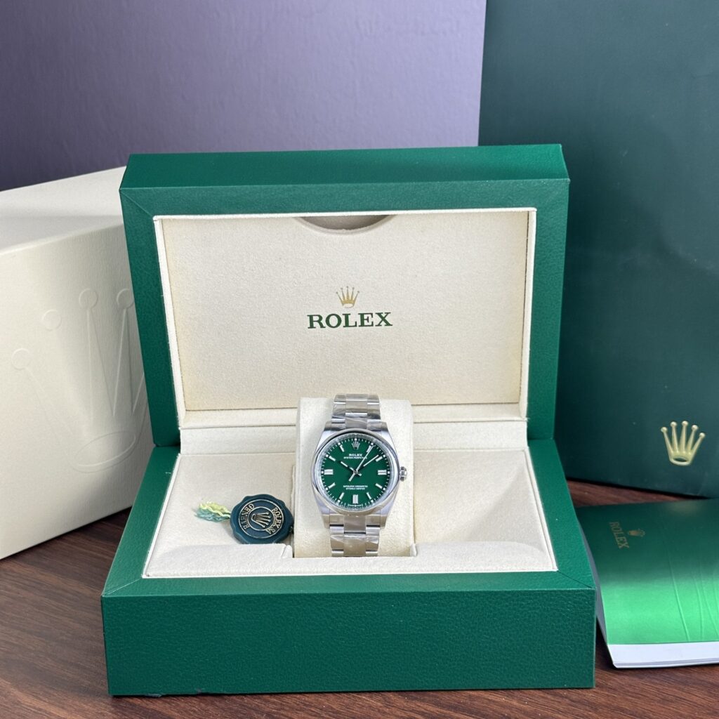 Rolex Oyster Perpetual 126000 Green Dial 36mm 1.jpg