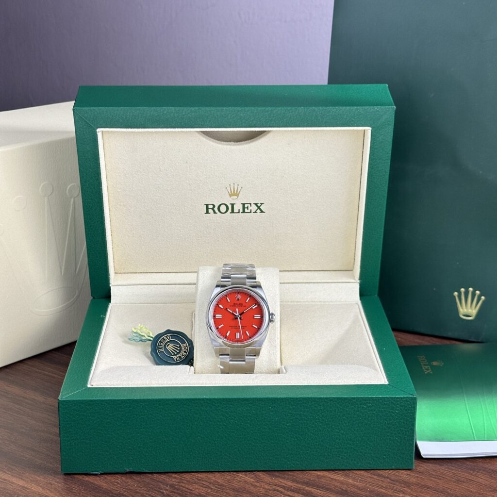 Rolex Oyster Perpetual 126000 Red Dial 36mm 1.jpg