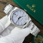 Rolex Oyster Perpetual 126000 purple Dial 36mm 2.jpg
